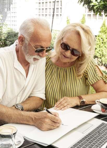 old-couple-taking-notes-agenda